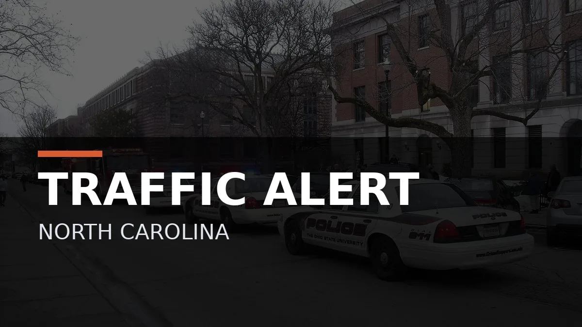 Police close an Uptown Charlotte intersection while investigating a homicide scene